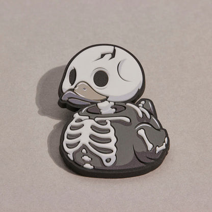 Pin's TUBBZ Numskull – Squelette phosphorescent